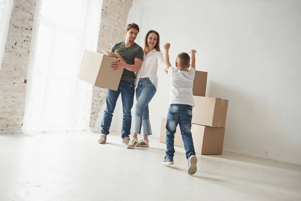 give-me-hug-playful-mood-from-kid-family-have-removal-into-new-house-unpacking-moving-boxes